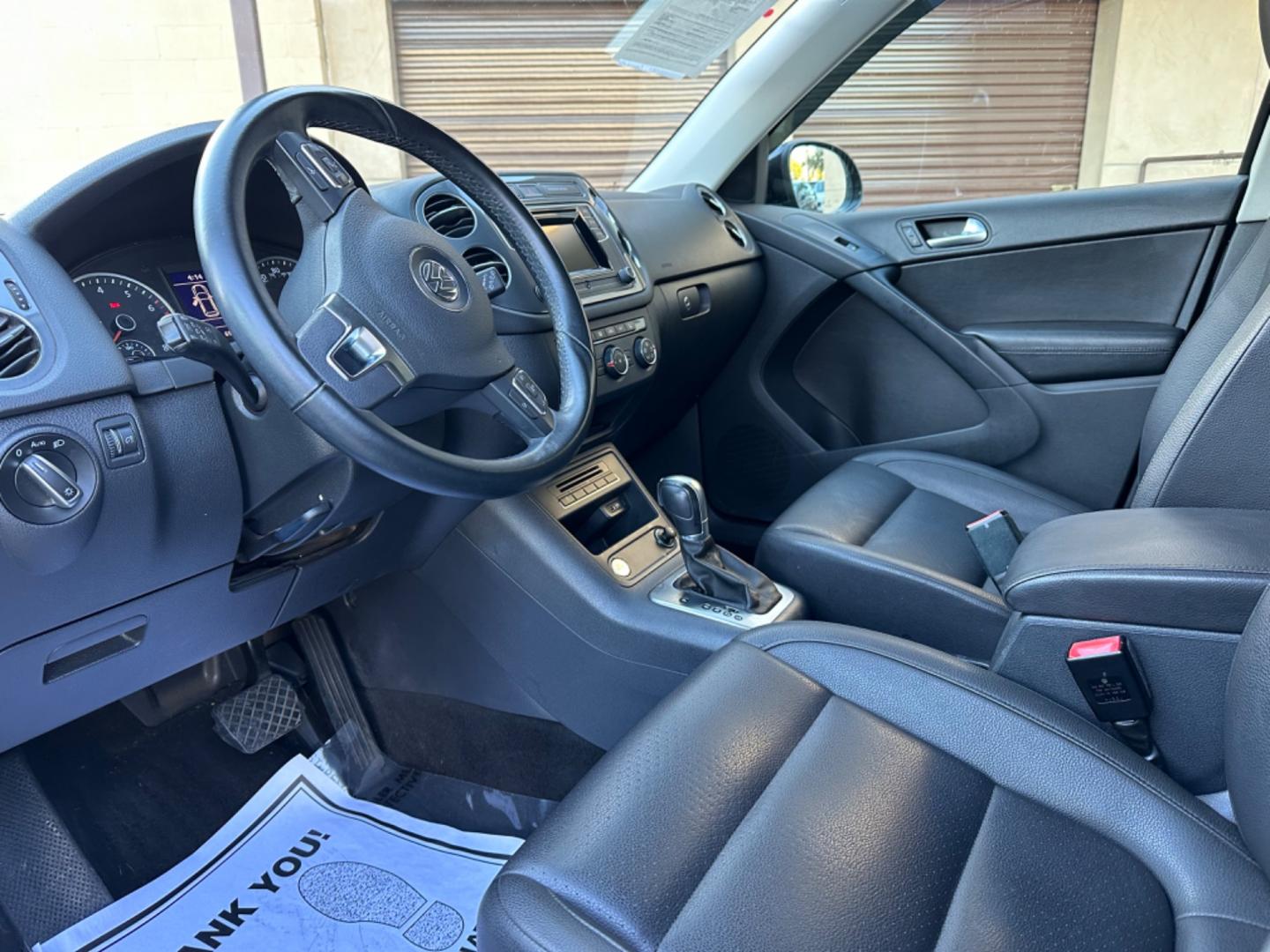 2016 Black /Black Volkswagen Tiguan (WVGAV7AX5GW) , AUTOMATIC transmission, located at 30 S. Berkeley Avenue, Pasadena, CA, 91107, (626) 248-7567, 34.145447, -118.109398 - Crown City Motors is a used “Buy Here Pay Here” car dealer in Pasadena CA. “Buy Here Pay Here” financing, means that when you purchase your vehicle from our dealership, that you make the payments to the dealership as well. We do not need the banks approval to get you approved for a used auto - Photo#18